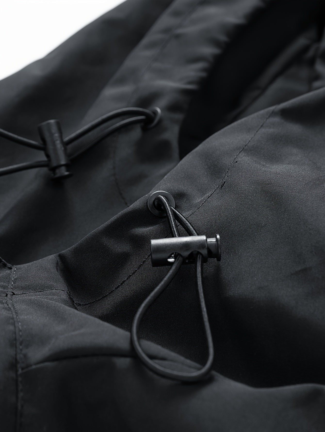 Black Oversized Water-Resistant Windbreaker Jacket with Graphic Details