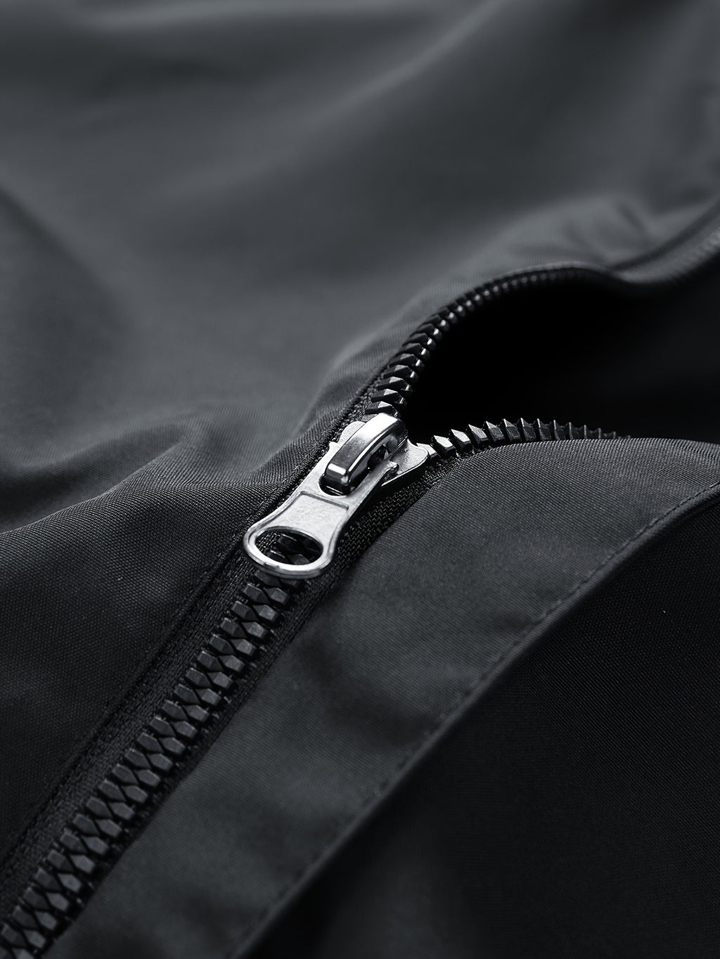 Black Oversized Water-Resistant Windbreaker Jacket with Graphic Details